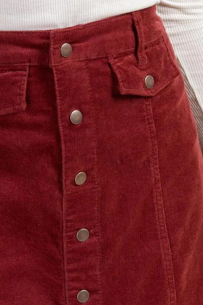 Burgundy button-front mini skirt with flap pockets