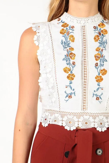 White embroidered sleeveless lace trim top